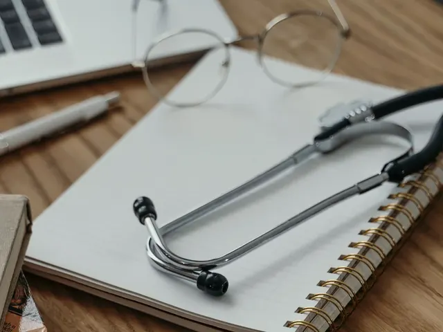 Personalised menopause consultations Stethoscope, glasses and notebook ready for a medical consultation